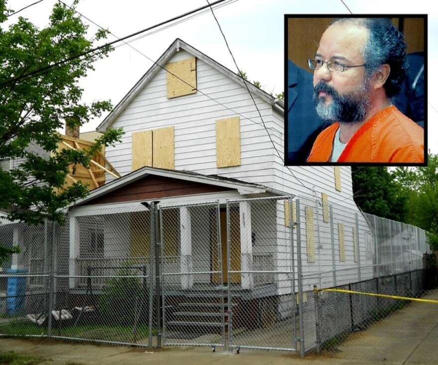 Ariel Castro (inset) and 2207 Seymour Avenue, where he kept three women captive for years (photo by Brian Bull)