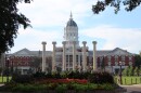 A wide shot of the MU campus columns with Jesse Hall behind