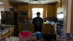Markus Lane, 33, stands in his family’s kitchen on July 16, 2024. His family was without power for more than a week after Hurricane Beryl.