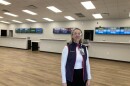 Angi Daus, Asheville Regional airport's vice president for air service and corporate communications, stands in the airport's new rental car building Monday, May 18, 2026.