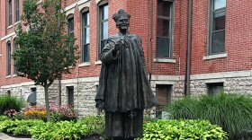A statue of the late Father Nelson Baker stands near the corner of South Park and Ridge Road in Lackawanna outside Our Lady of Victory Charities.