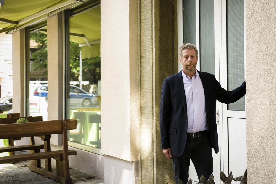 Uri stands outside the house in Berlin where his grandparents Paul and Sophie Berliner were seized before being sent to Auschwitz.