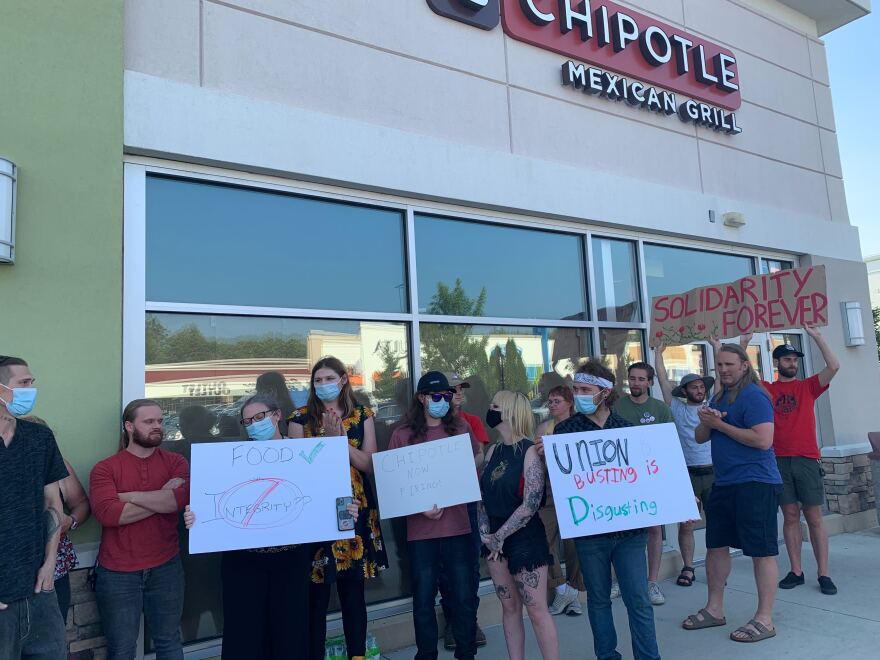 A group of employees and supporters gathered outside the Chipotle Mexican Grill on Tuesday evening to protest the company's decision to close the location. Employees say the closure is a textbook example of union busting.