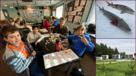 From left: Students at STARBASE Alpena pose for a photo in the middle of an assignment,
