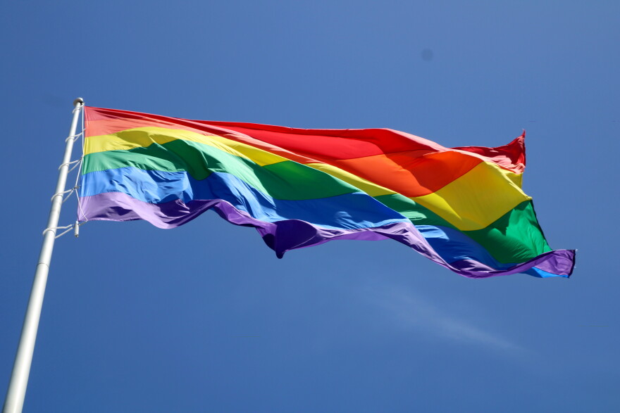 A Pride flag billows in San Francisco's Castro district