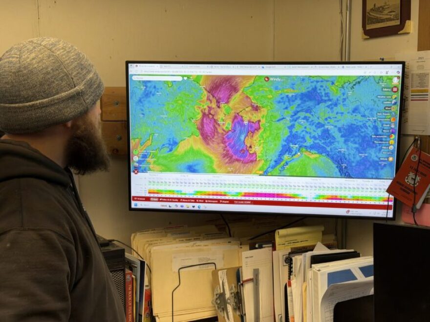 Nome Harbormaster Lucas Stotts looks at a wind forecast for the Bering Strait region. Harbor staff advised boat owners to secure their vessels in anticipation of the Sunday storm.