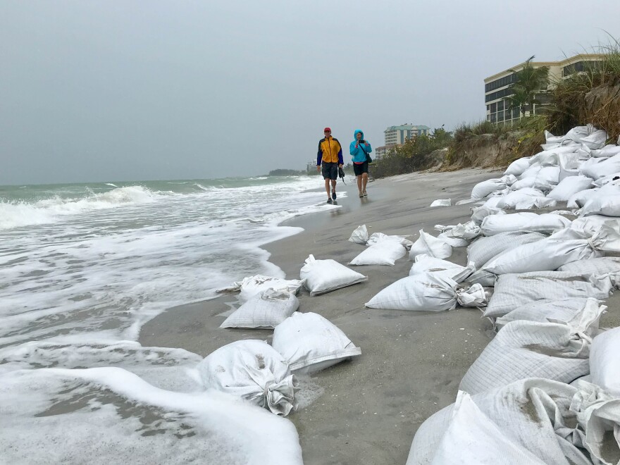 Bags of sand on the beach.