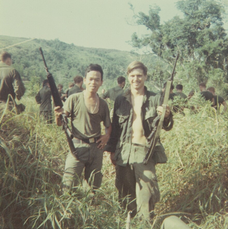 McCloughan (right) with a platoon interpreter in Nui Yon Hill, 1969. (Courtesy of James McCloughan)