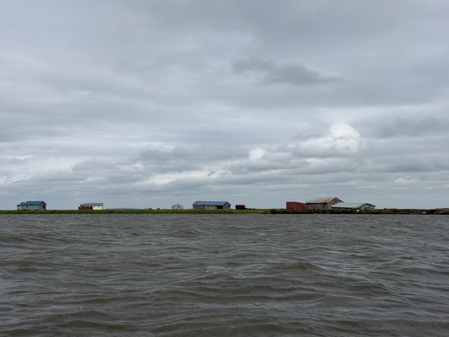 Houses in Caley Paul's neighborhood floated miles outside of the village the night of the storm. Now, they await winter to be brought back into Kipnuk. August 12, 2026.