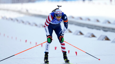 FILE - United States' Leif Nordgren crosses the finish line during the men's 4x7.5-kilometer relay at the 2022 Winter Olympics, Tuesday, Feb. 15, 2022, in Zhangjiakou, China.