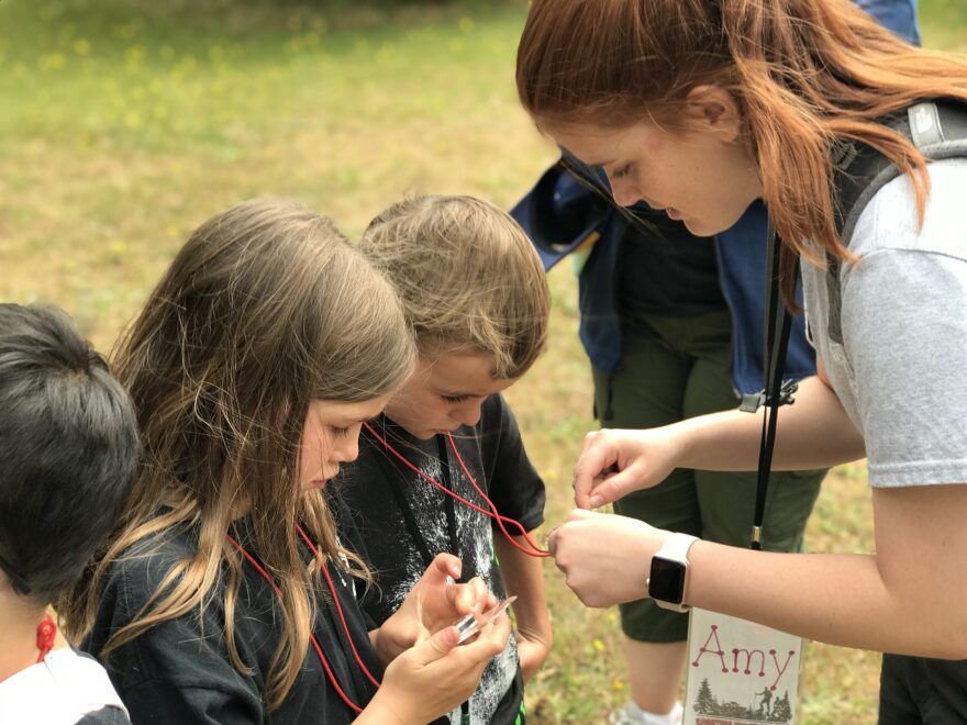 Amy Miseli, here teaching map and compass skills to Cub Scouts, plans to attend the BSA Boot Camp at Camp Thunderbird. Courtesy of Amanda Lafferty