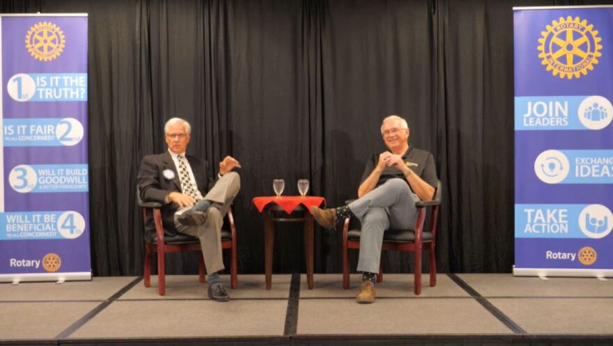 Bill Ochs, right, answers questions from Sioux Falls Downtown Rotary Club members and guests while rotarian Kurt Loudenbeck moderates.