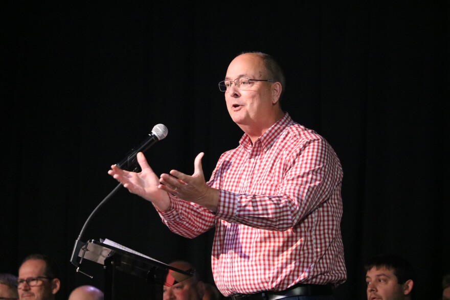 Greenup County Judge-Executive Bobby Hall addresses the crowd at a data center town hall. Community members presented concerns about transparency, water usage and potential jobs.