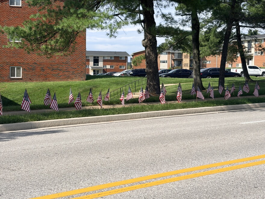 Path of Honor flag placement with nearly three-thousand flags planted along Putty Hill Avenue, Baltimore County.