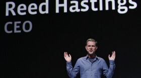 <p>Netflix has backed off its unpopular plan to split its service into two offerings — one for streaming video, and one for sending DVDs by mail. CEO Reed Hastings is seen gesturing in this file photo.</p>