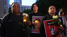 People attend a vigil to honor Dolores Huerta, a labor organizer whose advocacy improved conditions for migrant farm workers, Wednesday, Oct. 28, 2026, in Los Angeles.