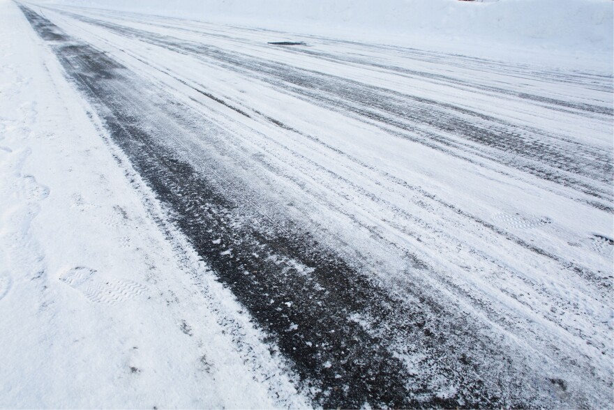 Snow that has been plowed on the road