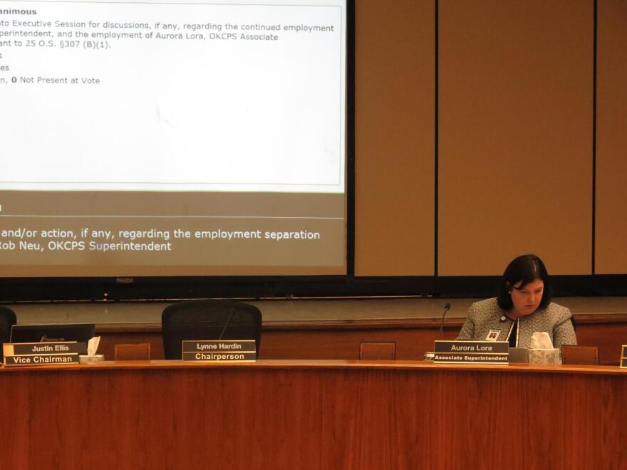 Oklahoma City Public Schools Associate Superintendent Aurora Lora waits on Board of Education members to emerge from executive session during an April 25, 2016 meeting.