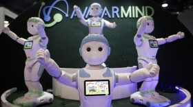 AvatarMind's iPal companion robots are displayed at CES International, Wednesday, Jan. 10, 2018, in Las Vegas. (AP Photo/Jae C. Hong)
