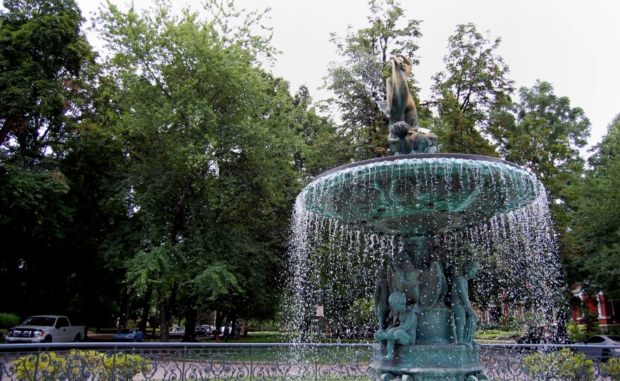 A bronze fountain stands in the center of St. James Court, a tree-covered boulevard in Old Louisville.