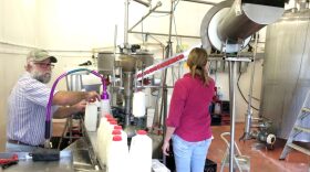 Howard Kurtz and his wife Leslie bottle raw milk at their dairy in Live Oak, Florida on Tuesday, Decmeber 17th in preparation for delivieries the next day.