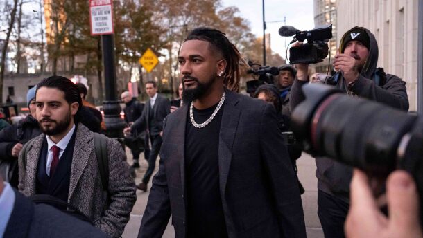 Cleveland Guardians baseball player Emmanuel Clase, center, leaves Brooklyn federal court, Thursday, Nov. 13, 2025, in New York.  