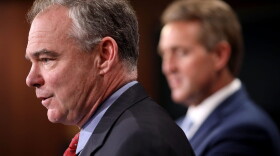 Sen. Tim Kaine (D-Va.) and Sen. Jeff Flake (R-Ariz.) talk about their introduction of a new Authorization for the Use of Military Force (AUMF) against the Islamic State of Iraq and Syria (ISIS), al-Qaeda and the Taliban during a news conference at the U.S. Capitol May 25, 2017 in Washington, D.C. (Chip Somodevilla/Getty Images)
