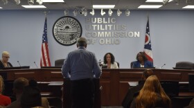 A man speaks before the Public Utilities Commission of Ohio, opposing a rate hike proposed by American Electric Power of Ohio on December 9, 2025.