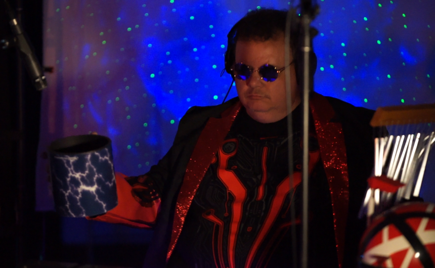 Rishi Maze performing live in WNIJ's Studio A