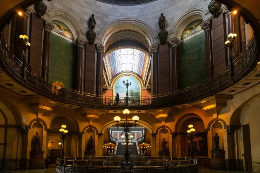 The view outside the governor’s second-floor office in the Illinois State Capitol building in Springfield. Above, the larger rail separates the House and Senate chambers.