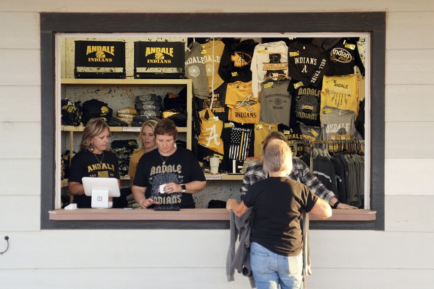 Clothing and other merchandise at the Andale High School stadium sports the Indians logo and other Native American-themed images.