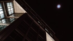 The St. Louis City Justice Center is illuminated by the moon on Tuesday, Jan. 27, 2026, in downtown St. Louis.