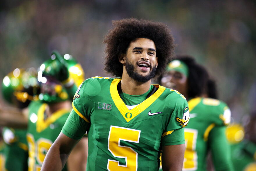 Oregon quarterback Dante Moore (5) dances to "Shout" during the second half of an NCAA college football game against Portland State, Friday, Sept. 18, 2026, in Eugene, Ore.