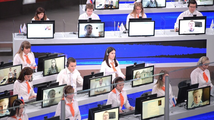 Operators take live calls from across Russia. The call center received some 2 million messages, including 1.3 million phone calls.
