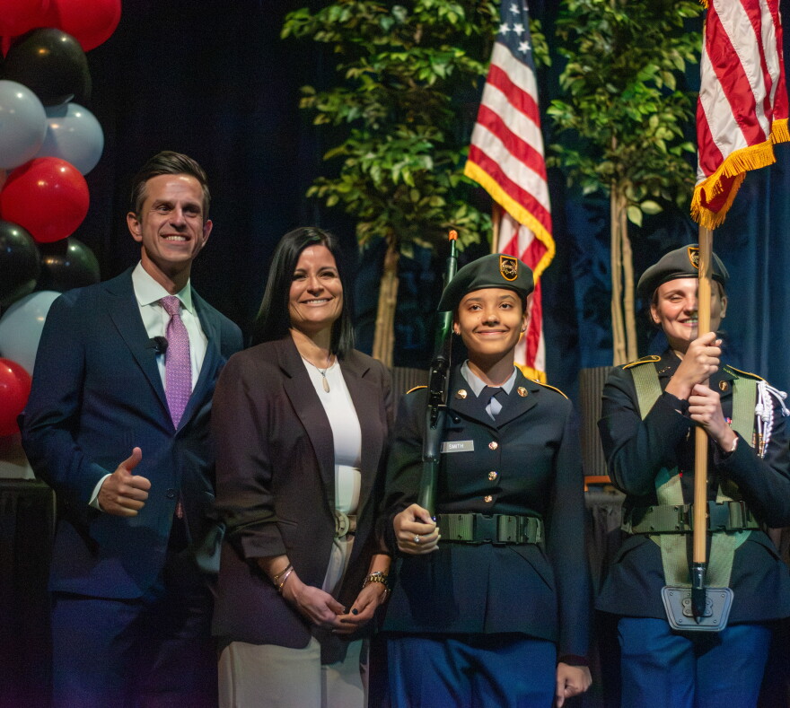 Florida Education Commissioner Henry Mack poses with Lake Buena Vista High School Principal Maricarmen Aponte and students before the final public listening session on proposed updates to Florida’s B.E.S.T. science standards.