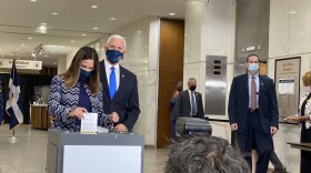 Vice President Mike Pence and wife Karen pence cast absentee ballots in Indianapolis Friday.