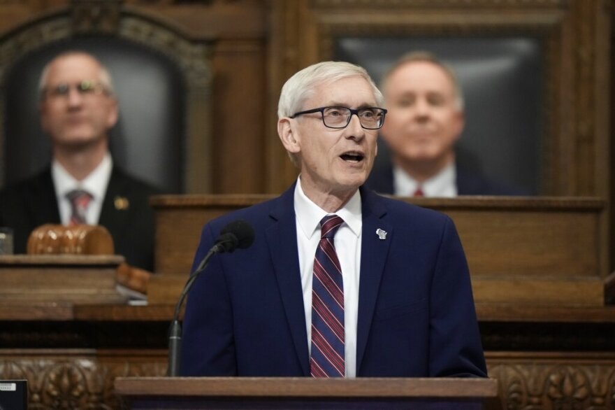 Wisconsin Gov. Tony Evers speaks during the annual State of the State address Tuesday, Jan. 24, 2023, in Madison, Wis. The state budget plan Evers unveils Wednesday, Feb. 15, will include tax cuts for the middle class, a plan to keep the Milwaukee Brewers in their stadium until at least 2043, higher spending for public schools and a new way to fund local governments.