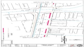 The latest version of the Liberty Street road diet has four travel lanes, a center turn lane and medians in places, as well as 24-hour parking on the north side of the street. 