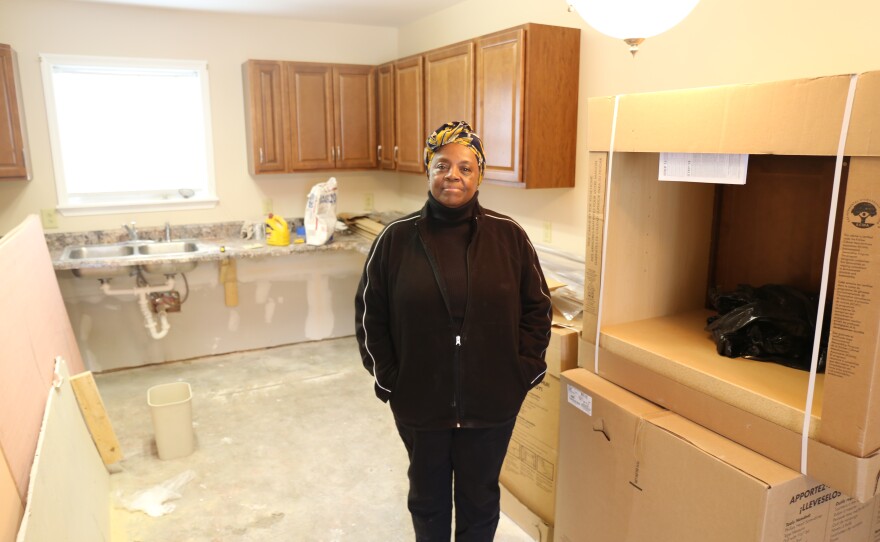 Mullins resident Barbara Sellers stands in an apartment being renovated again after Hurricane Matthew flooded the area in October 2016.