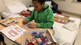Karin Broadhurst says her son, pictured here in his hospital room, has been boarding for 33 days at Boston Children's Hospital while awaiting an inpatient psychiatric bed anywhere in Massachusetts. (Courtesy)