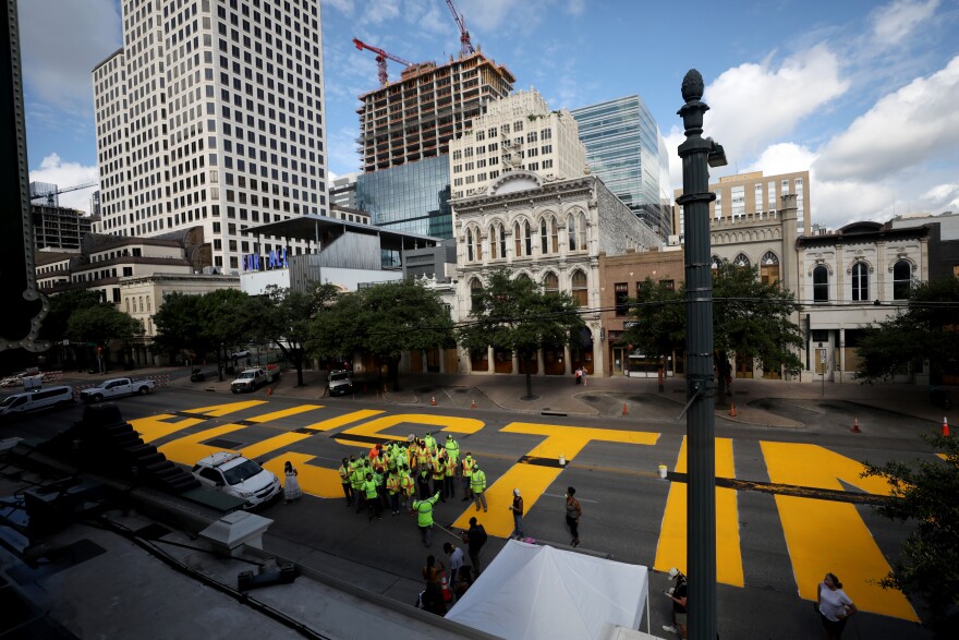 The "Black Austin Matters" mural spans Sixth Street to Ninth Street in downtown Austin.