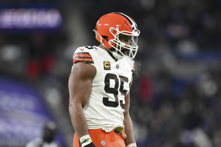 Cleveland Browns defensive end Myles Garrett (95) looks on between plays during the first half of an NFL football game against the Baltimore Ravens, Saturday, Jan. 4 2025, in Baltimore.