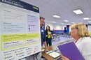Duggan O'Dea talks with a Schuylkill County resident about Nebius at North Schuylkill High School.