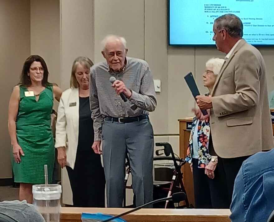 By special proclamation the Peoria County Board honored Wheels 'O Time Museum of Dunlap on their 40th anniversary. Museum co-founder Gary Bragg is pictured acknowledging the proclamation.
