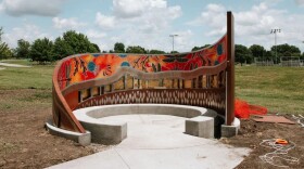 A view of Fire Keepers Circle as artist Aaron Squadroni finishes the piece.