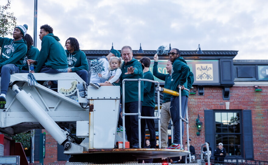 Michigan State University basketball coach Tom Izzo waves to attendees of the Michigan State University Homecoming Parade in East Lansing, Mich., on Oct. 9, 2026.