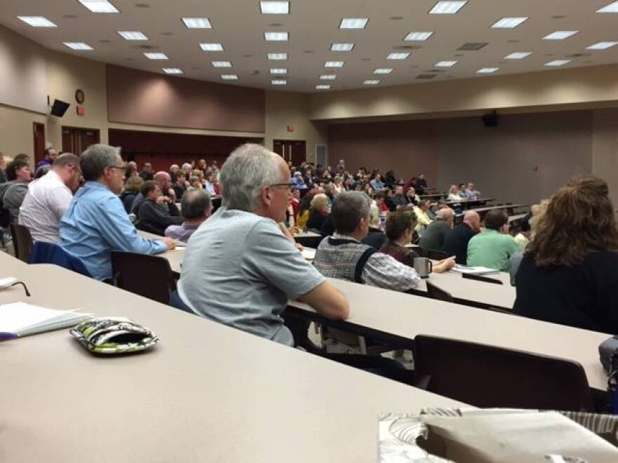 Most of the Saint Joseph's College faculty met with the chairman of the school's board of trustees Monday.