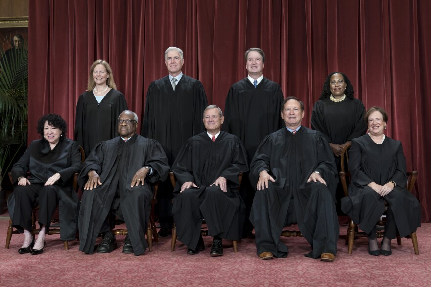 Members of the Supreme Court sit for a group portrait following the addition of Associate Justice Ketanji Brown Jackson last October.