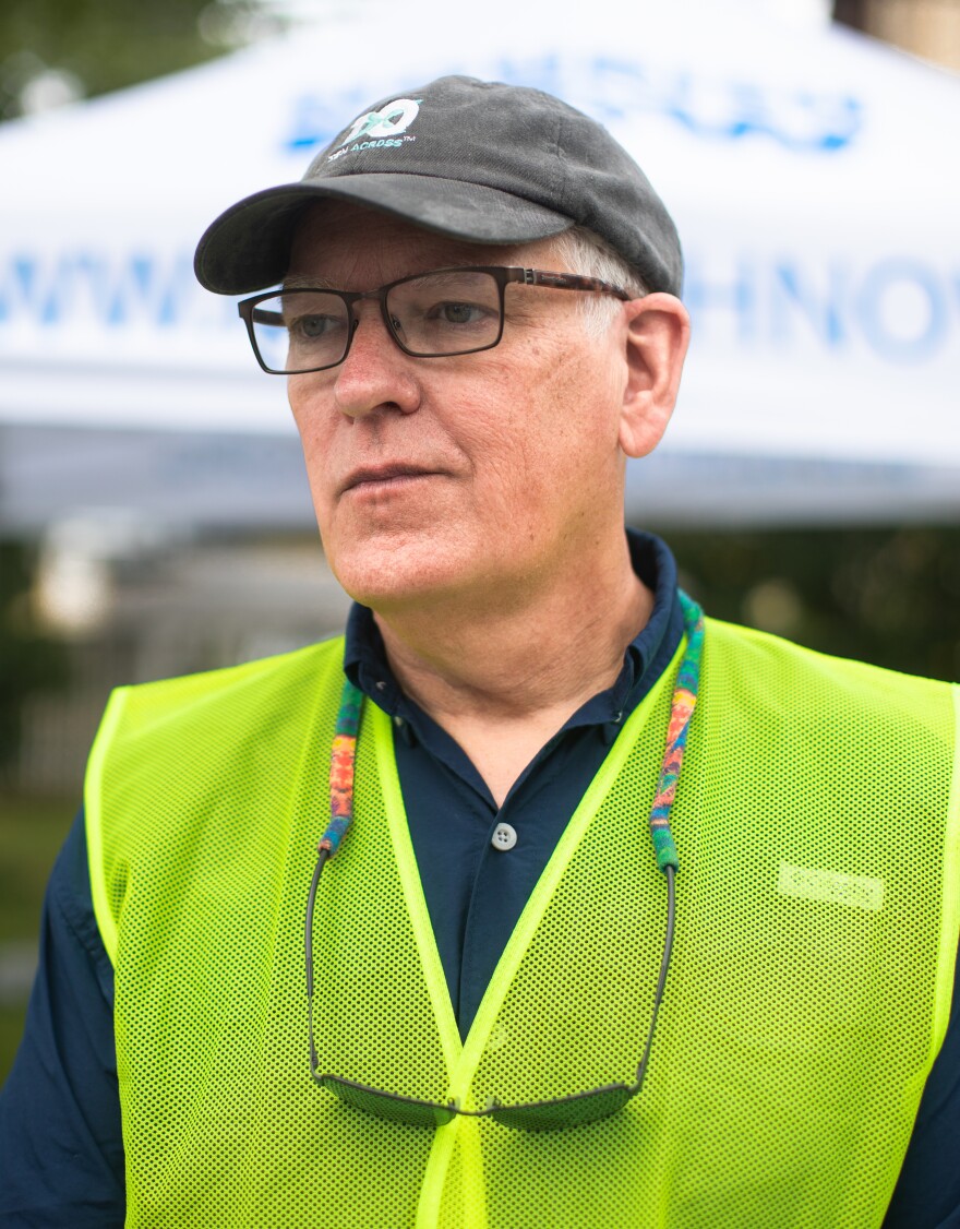 Volunteer John Ross sees the effort as something beyond the transactional delivery of food to those in need. "It's the care that comes along with this too," he said.