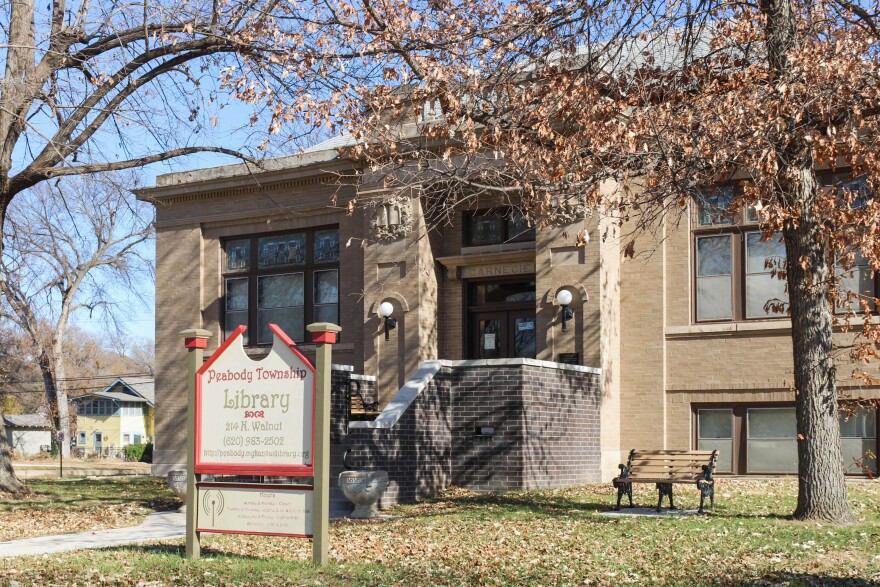 The Carnegie library opened in Peabody in 1914, was the town's second library. A small white building — now located behind the Carnegie library — was the town library from 1874 to 1914.
